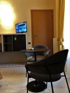 TV a/nebo společenská místnost v ubytování Hotel Tirrenia