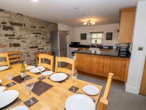 Η κουζίνα ή μικρή κουζίνα στο Auckland Cottage