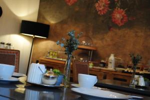TV a/nebo společenská místnost v ubytování Hotel am Bach