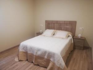Postel nebo postele na pokoji v ubytování Apartamento El Fondon