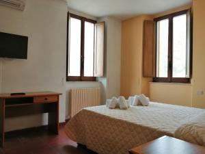 Casa per Ferie Ulivo d'Assisi客房内的一张或多张床位