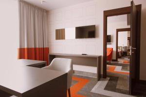 TV a/nebo společenská místnost v ubytování Vedensky Hotel