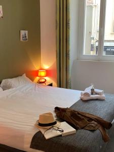 Cama o camas de una habitación en Cannes City Suites