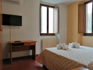 Casa per Ferie Ulivo d'Assisi客房内的一张或多张床位