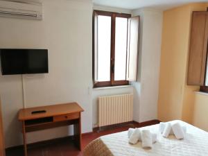 Casa per Ferie Ulivo d'Assisi客房内的一张或多张床位