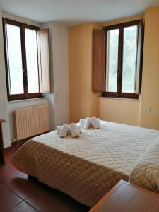 Casa per Ferie Ulivo d'Assisi客房内的一张或多张床位