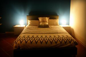 Cama o camas de una habitación en B&B Taccu Maccu