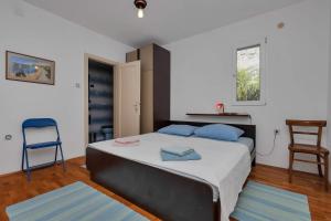 Posteľ alebo postele v izbe v ubytovaní Apartments Vele