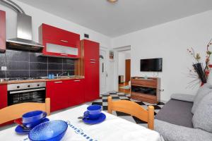 Kuchyňa alebo kuchynka v ubytovaní Apartments Vele