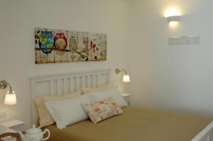 Postel nebo postele na pokoji v ubytování Carpe Diem B&B e Case Vacanza