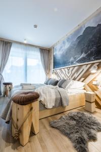 Posteľ alebo postele v izbe v ubytovaní Apartamenty Royal Resort Spa + 37 fotografií