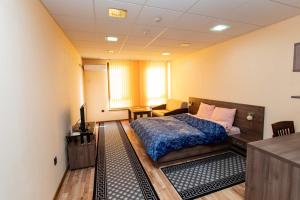 Postel nebo postele na pokoji v ubytování Стая за гости Пентагона