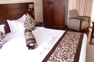 The White Rhino Hotel客房内的一张或多张床位