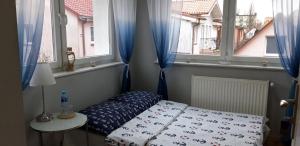 Postel nebo postele na pokoji v ubytování Orzechowa Przystań