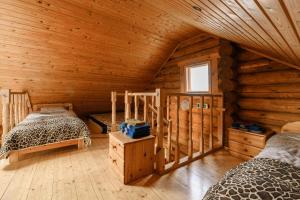 Postel nebo postele na pokoji v ubytování Nuustaku Guesthouse