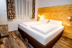 Posteľ alebo postele v izbe v ubytovaní Fischer Ferienhaus