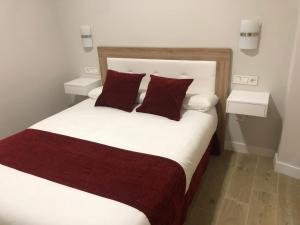 Posteľ alebo postele v izbe v ubytovaní Pinar Malaga Rooms