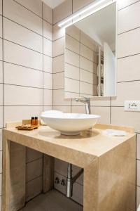 Kúpeľňa v ubytovaní Domus Porto Di Traiano Resort