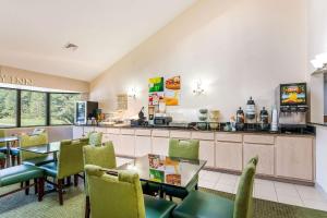 a fast food restaurant with tables and chairs at Quality Inn Petersburg Near Fort Gregg-Adams in Southern Estates