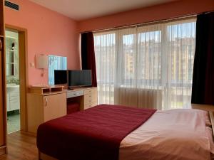 Ένα ή περισσότερα κρεβάτια σε δωμάτιο στο Hotel Brkic