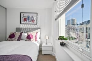 City Prime Apartments客房内的一张或多张床位