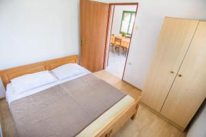 Postel nebo postele na pokoji v ubytování House Bellatrix