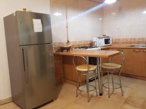 Agreable Appartement Ennasr 2にあるキッチンまたは簡易キッチン