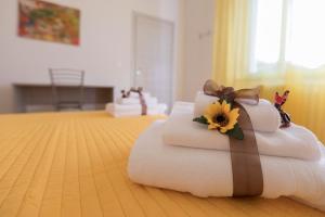 Posteľ alebo postele v izbe v ubytovaní B&B NONNO PEPPE