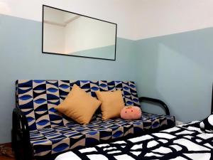 Postel nebo postele na pokoji v ubytování Cozy condo unit 5mins from Mactan Cebu Int'l Airport with Netflix
