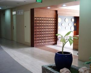 Fotografie z fotogalerie ubytování Cozy condo unit 5mins from Mactan Cebu Int'l Airport with Netflix v destinaci Mactan