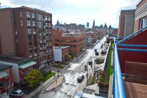 a city street filled with lots of tall buildings at ByWard Blue Inn in Ottawa