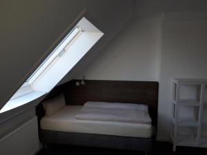 Postel nebo postele na pokoji v ubytování Hotel Weinert