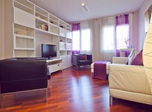 TV a/nebo společenská místnost v ubytování Ciutadella Park Born