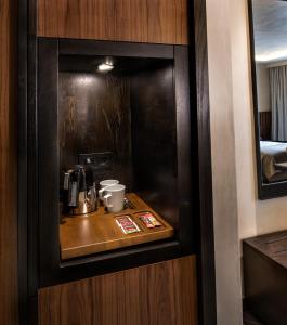 a room with a counter with a coffee maker on it at Hotel Bosfora Plus in Istanbul