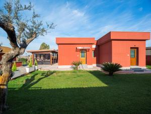 Vonkajšia záhrada v ubytovaní Domus Porto Di Traiano Resort