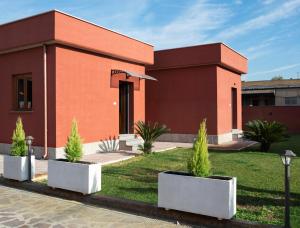 Vonkajšia záhrada v ubytovaní Domus Porto Di Traiano Resort
