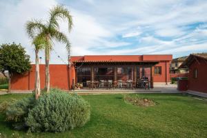 Vonkajšia záhrada v ubytovaní Domus Porto Di Traiano Resort