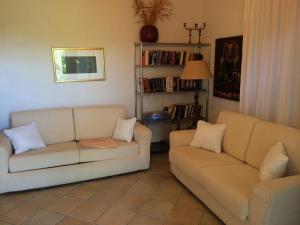 A seating area at Villa Oleandro - 2349447