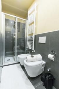 a bathroom with a shower and a toilet and a sink at Love and magic in Limone in Limone Piemonte