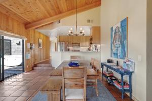 a kitchen with a table and chairs in a room at Windrow Retreat in Sea Ranch