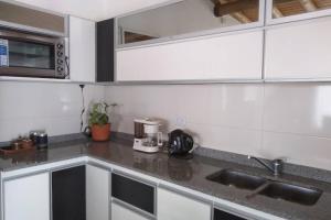 Una cocina o kitchenette en Voy con vos - casa en Vista Flores