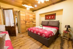 a bedroom with a large bed in a room at Love and magic in Limone in Limone Piemonte
