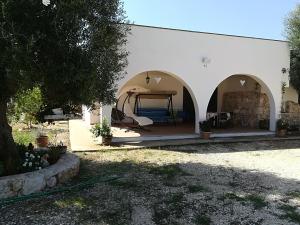 Фотография из галереи Trullo Alessandro e Villa Raffaela в городе Сан-Вито-деи-Норманни