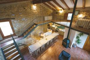 an overhead view of a dining room in a building at Casa rural Mas del Serranet in Horta de San Joan