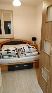 En eller flere senge i et værelse på Gdańska 5