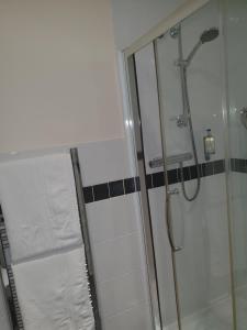 A bathroom at The Old Times Guest House 