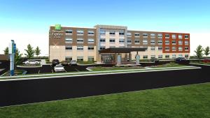 una representación de un edificio de hospital con un estacionamiento en Holiday Inn Express & Suites - Detroit North - Roseville, an IHG Hotel, en Roseville