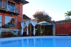 A piscina localizada em Pousada Ikabana ou nos arredores