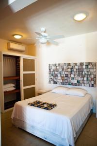 Ένα ή περισσότερα κρεβάτια σε δωμάτιο στο Caribe Dream Private Beach