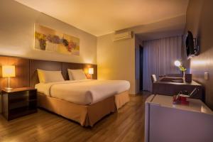 Postel nebo postele na pokoji v ubytování H3 Hotel Paulista + 37 fotografií